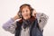 Elderly lady listening music with headphones
