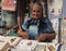 Elderly Lady Selling Embroidery Work In Loule