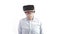 elderly looking man looking around in his vr goggles and being in awe of the vr enviorment. White background. Medium