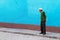 Elderly man alone on the sidewalk of the streets of Trinidad