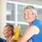 Elderly man drinking sports drink