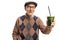 Elderly man holding a vegetable green smoothie