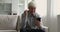 Elderly man holds cellphone read sms celebrate great news