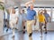 Elderly man learning dynamic dances at group choreography lesson