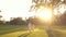 Elderly man and little girl outdoors.