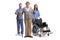 Elderly man and medical workers in blue uniforms standing with a wheelchair