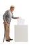 Elderly man putting a ballot into a voting box