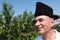 Elderly man in Russian Karakul Kubanka Cossack Hat