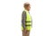 Elderly man with a safety vest standing