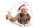 Elderly man with a santa claus hat breaking through paper and making a thumb up