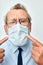 elderly man in shirt with tie medical mask safety isolated background