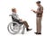 Elderly man talking to a disabled man in a wheelchair