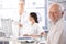 Elderly man waiting for examination smiling