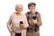 Elderly man and woman listening to music on headphones and smiling