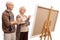 Elderly man and woman painting on a canvas with paintbrushes