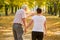 Elderly marriage strolling in park