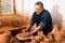 Elderly master at the pottery workshop