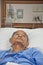 Elderly patien in hospital lay on the bed