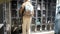 Elderly pensioner woman search for empty safe locker in grocery supermarket.