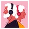 Elderly people listen to music on headphones.