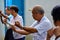 Elderly people practising tai chi