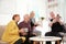 Elderly people spending time together in room