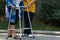 Elderly physical therapy by caregiver in hospital backyard, close-up