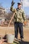 Elderly Russian farmer with bucket