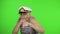 Elderly sailor man is angry and shows a fists. Sailorman on chroma key