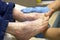 Elderly senior woman getting feet examined by podiatrist