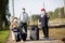 elderly seniors people with face masks waiting train before traveling during a pandemic