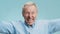 Elderly sport supporter. Close up portrait of emotional senior man football fan cheering for his favorite soccer team