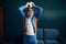 Elderly sportsman in uniform poses with ball