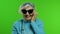 Elderly stylish caucasian grandmother woman talking on mobile phone. Chroma key