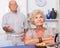 Elderly upset woman having problems in relationship with husband