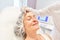 Elderly woman is being prepared for a facelift with dermal filler