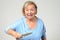 Elderly woman brandishing a kitchen knife