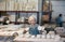 Elderly woman ceramist working in pottery workshop