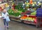Elderly woman denim jeans vegetables Carmel market, Tel Aviv