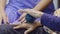 Elderly woman doing rubber ball for exercise fingers, palm ,hand and foot mus