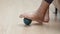 Elderly woman doing rubber ball for exercise fingers, palm ,hand and foot muscle with caregiver take care