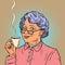 Elderly woman drinking coffee