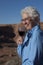 Elderly Woman Enjoying a Glass of Wine