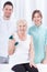 Elderly woman exercising with dumbbell