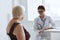 elderly woman with glasses examination by a doctor medical office