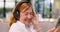 Elderly woman, headphones and cellphone for music listening for retirement, entertainment or streaming. Female person