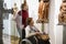 Elderly woman and her handicapped female friend at gallery