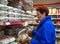 Elderly woman holding a box of eggs in her hands