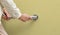 Elderly woman holding on handrail for safety walk steps