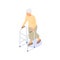 An elderly woman moves leaning on a walker.